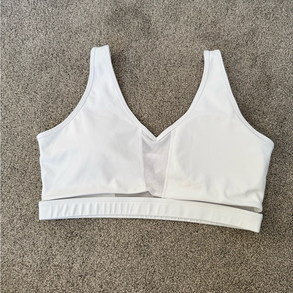 BuffBunny Classic White Sports Bra with front separation style.